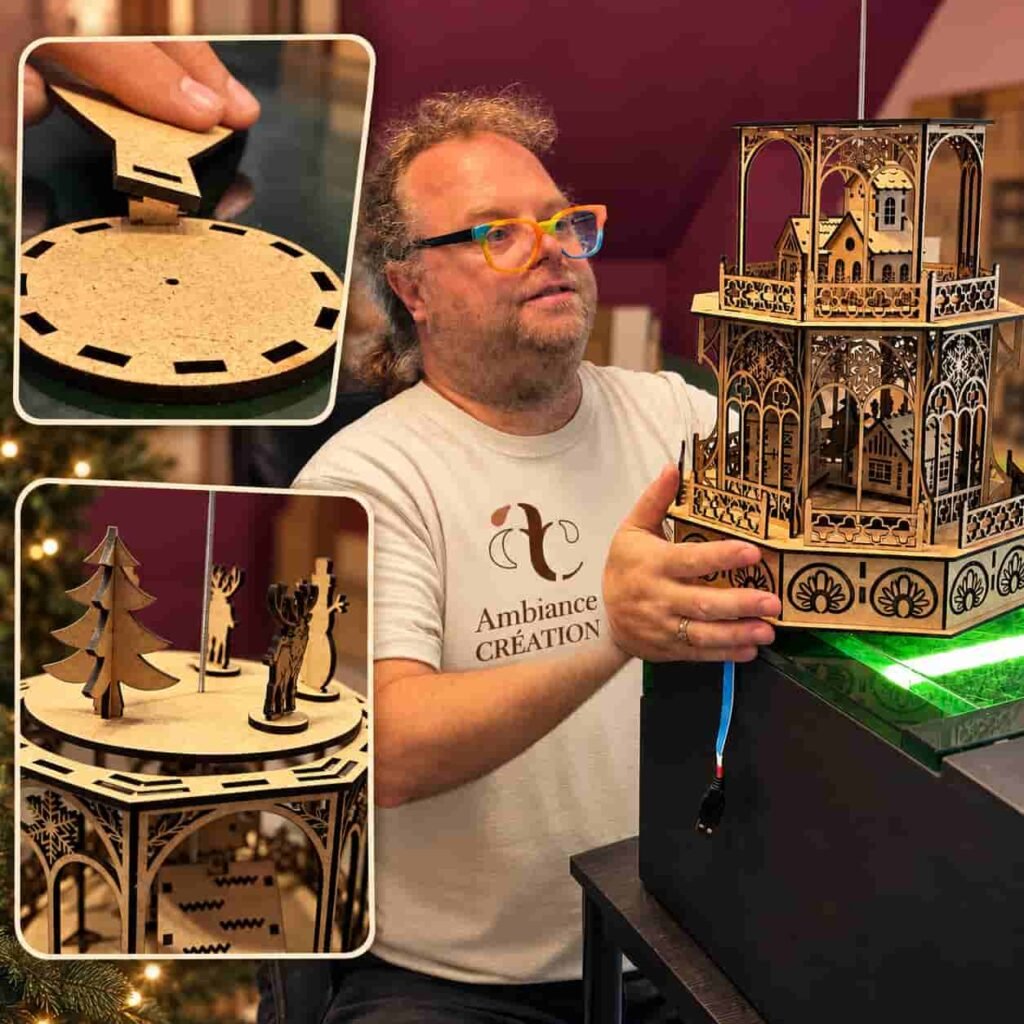 Artisan d’Ambiance Création présentant La Tour enchantée tournante en MDF, nouveauté de Noël 2026.